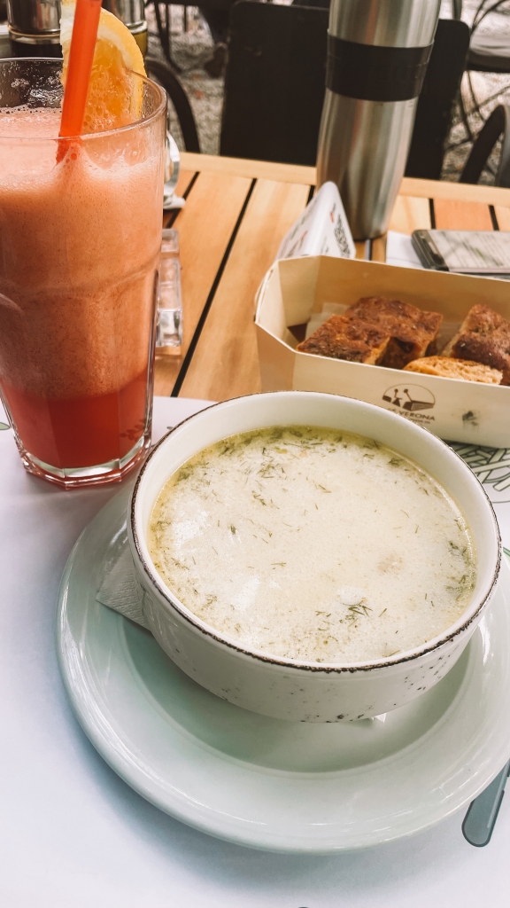 Soup and smoothie at a garden for lunch in Bucharest